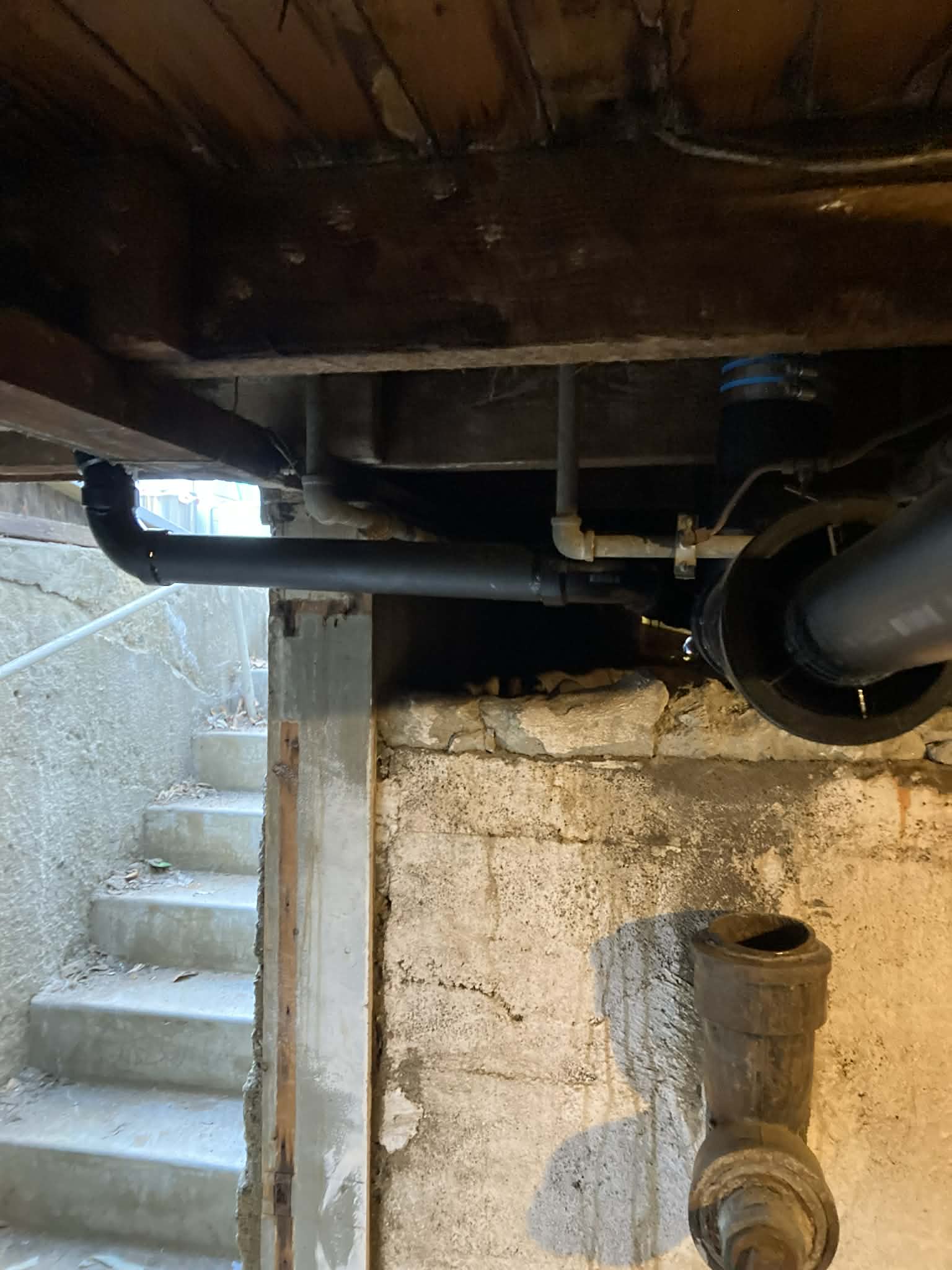 Crawl space drain pipe repair and installation