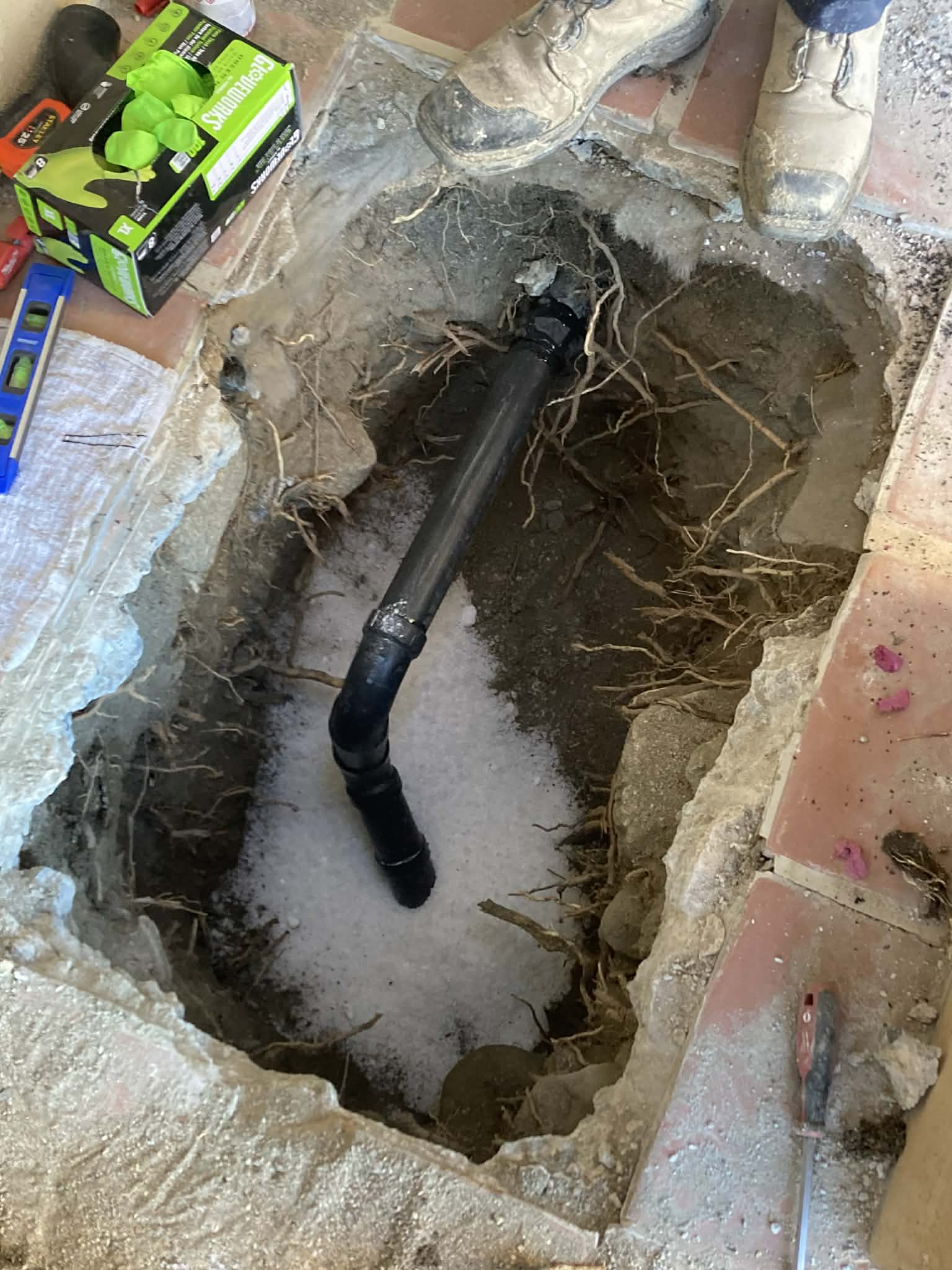 Underground sewer line excavation and replacement